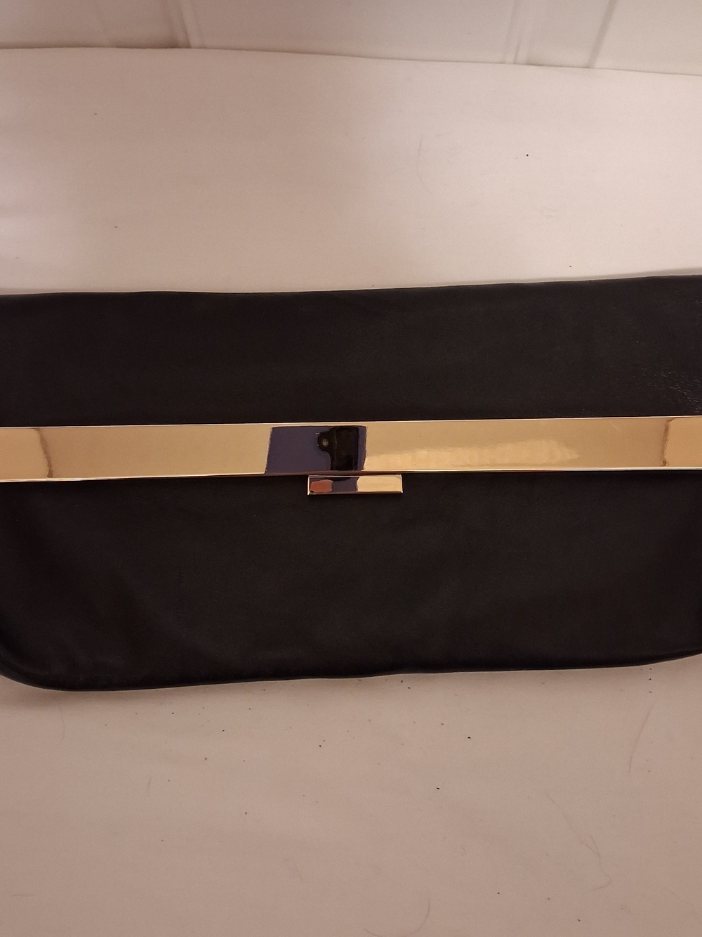 Vince Camuto Black Fold Over Clutch with Gold Bar Accent